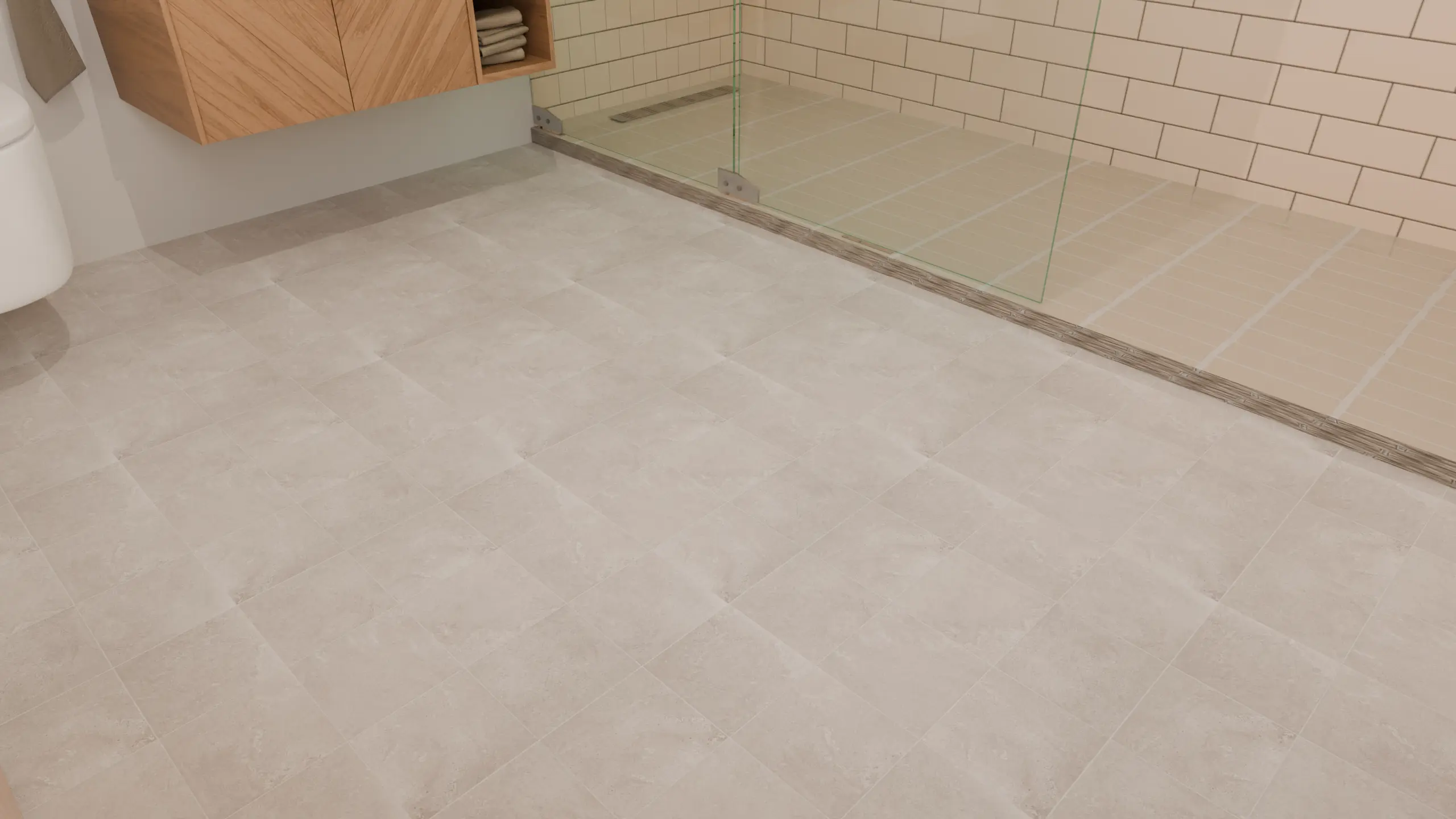 Close-up of greige stone-look floor tiles with subtle tonal variations and low-contrast grout lines.